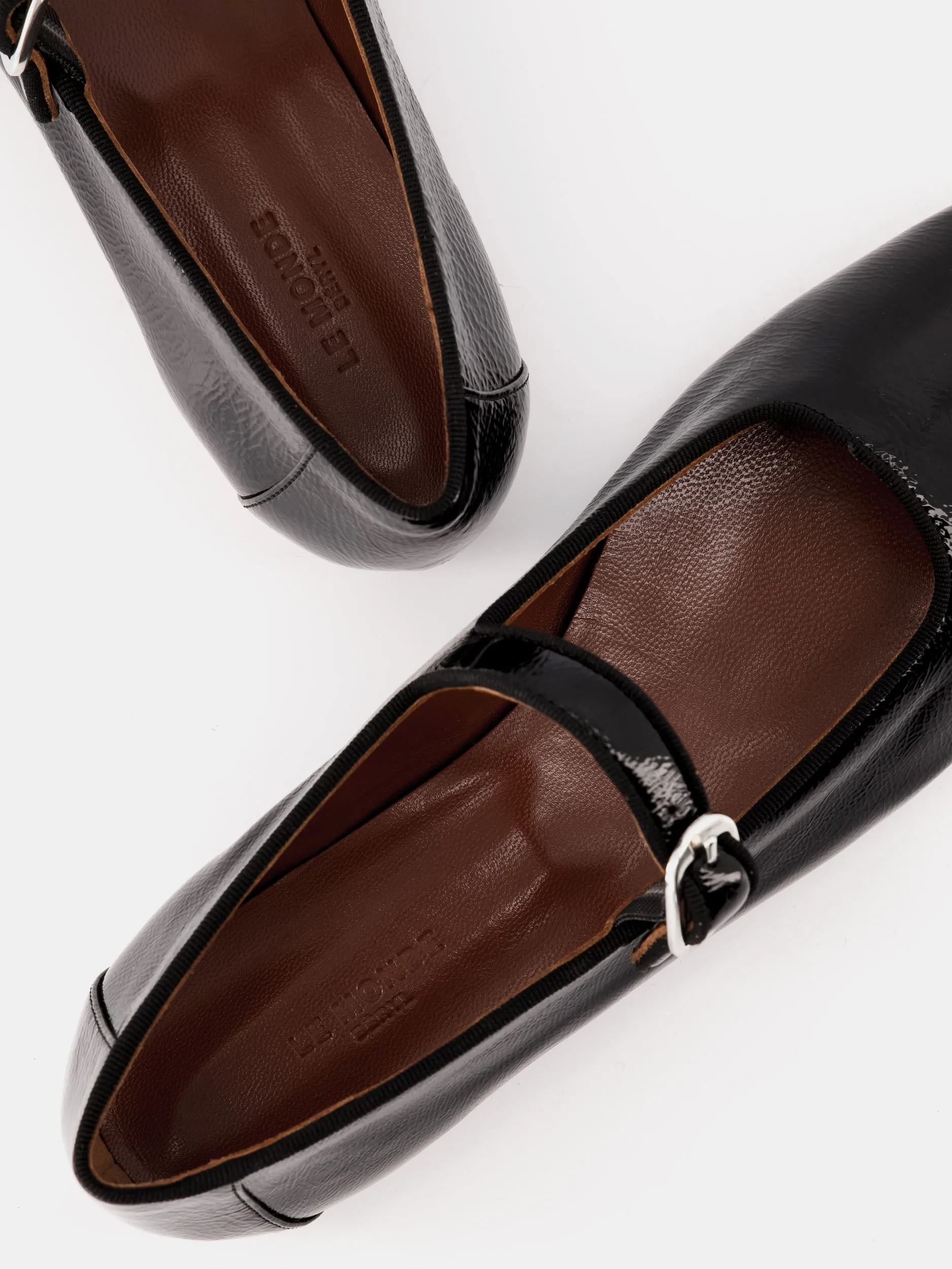 Black patent leather Mary Jane flats